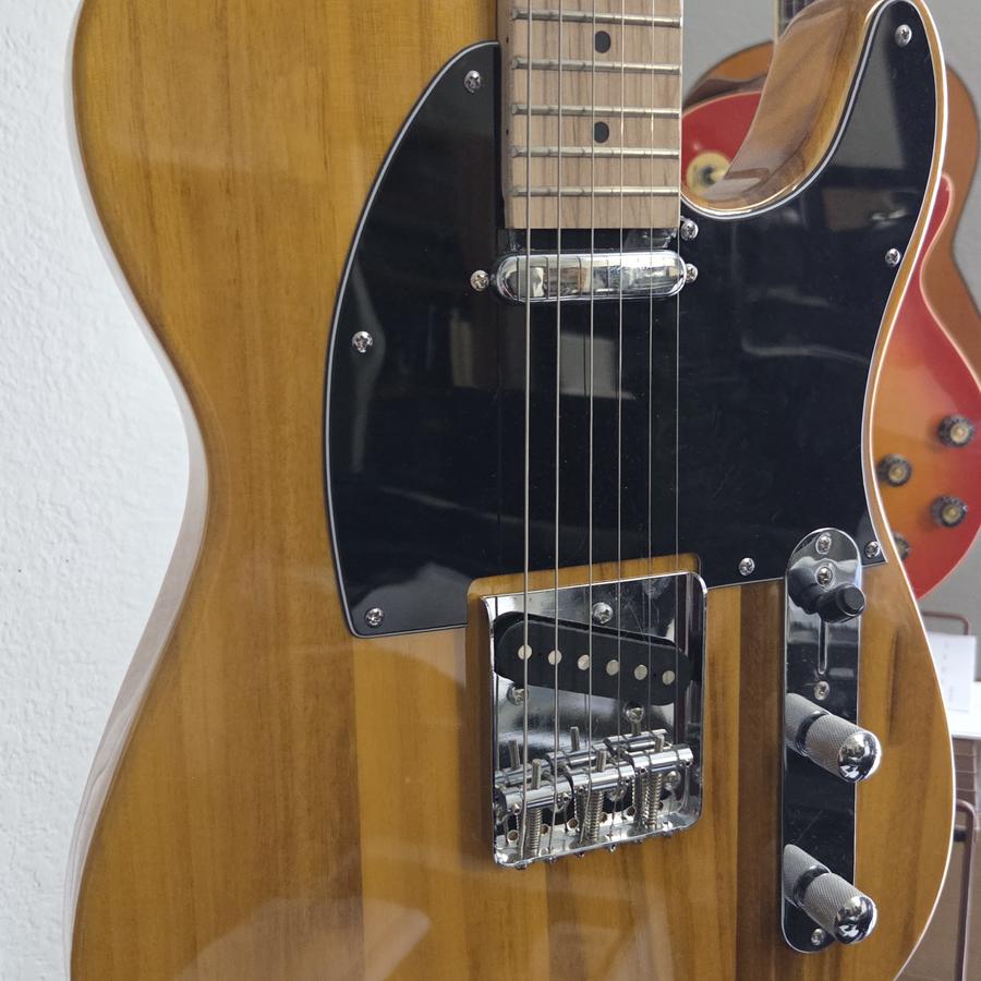 Natural-finish Telecaster guitar